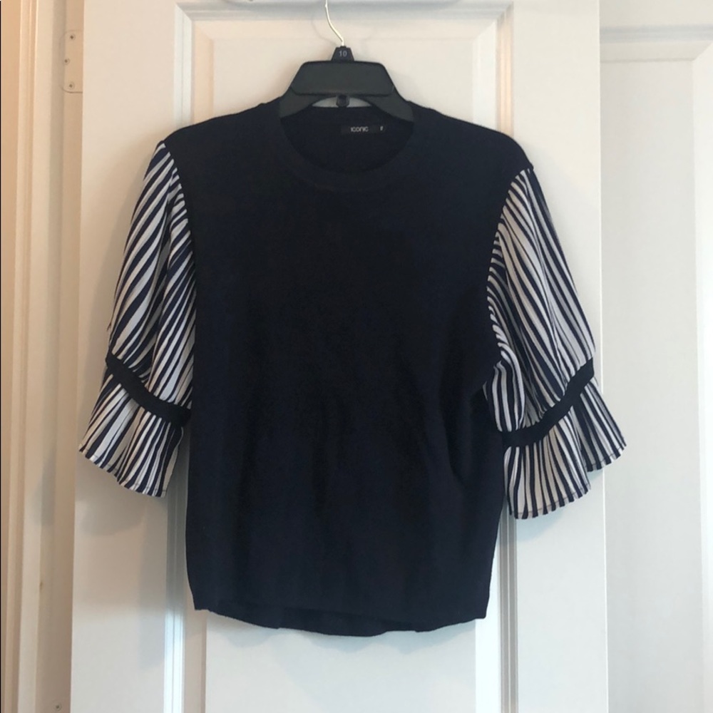 Blue sweater with ruffled sleeves